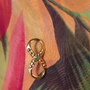 Vintage signed Hattie Carnegie Infinity tach brooch pin 134